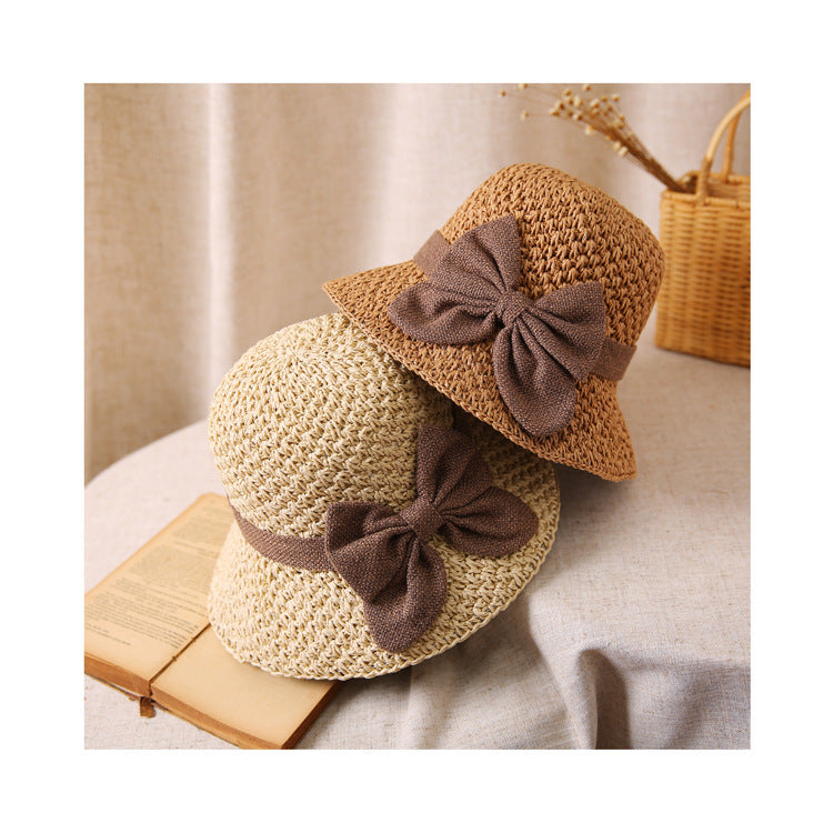 Cappello di paglia in stile francese con fiocco 👒 — Design intrecciato traspirante, ampia falda ondulata, protezione solare ed effetto snellente per il viso. Vestibilità regolabile (non vola via!), pieghevole e compatto 🌊