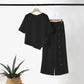 Completo due pezzi asimmetrico 👗: Top asimmetrico + Pantaloni con abbottonatura singola — Vestibilità ampia e traspirante 🛍️