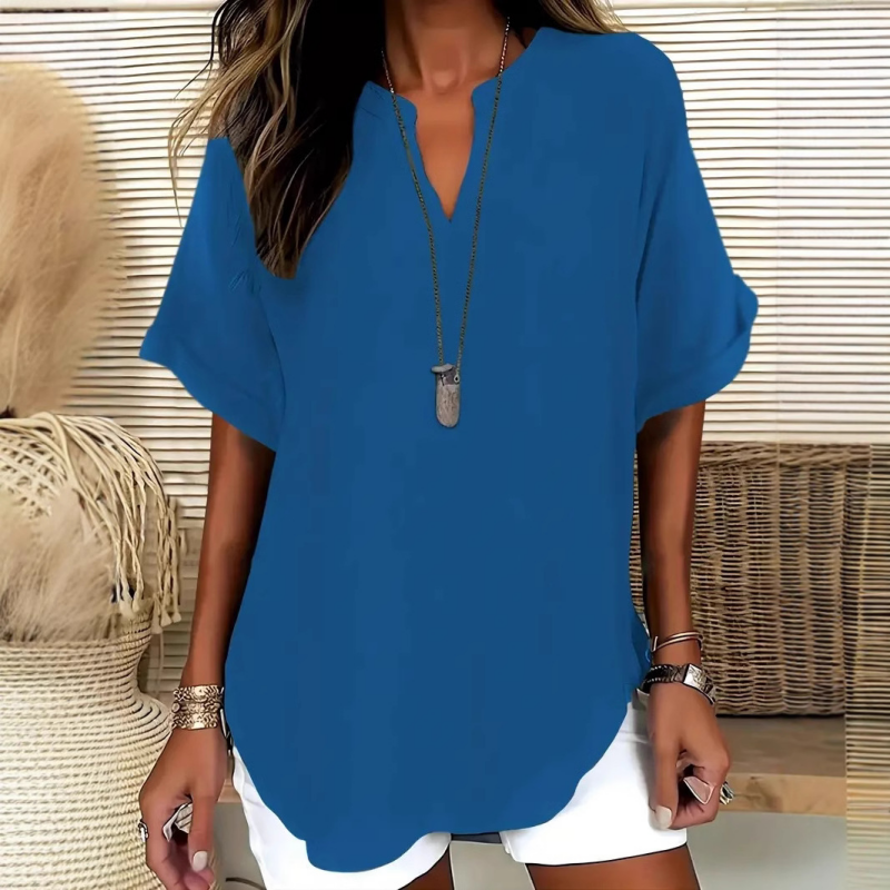 👚SCONTO DEL 60%! 🔥Top alla moda a maniche corte, ampio, con scollo a V profondo, orlo asimmetrico e tessuto leggero (5 colori, taglie dalla S alla 2XL) 🌸