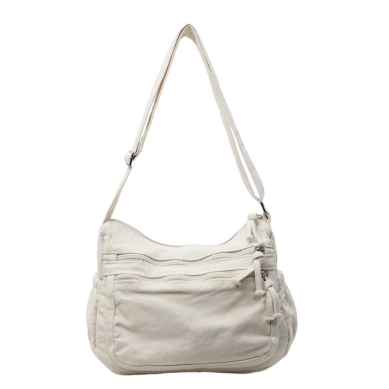 Borsa in tela multi-tasche 🎒 Leggera e resistente, tracolla regolabile, può essere indossata a spalla o a tracolla 👜