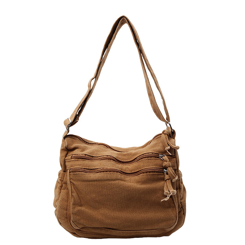 Borsa in tela multi-tasche 🎒 Leggera e resistente, tracolla regolabile, può essere indossata a spalla o a tracolla 👜