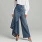 Jeans asimmetrici a portafoglio 👖 A metà tra slip e pantaloni, a vita alta per slanciare le gambe, taglio ampio e fluido, bottoni posizionati in diagonale: trasformati in una fashionista in un istante! ✨